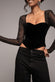 DIAMANTE LONG SLEEVE VELVET DIPPED HEM TOP T244